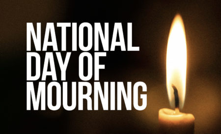 photo of candle with the words 'national day of mourning'