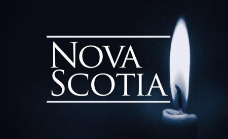 Image of a candle with the words Nova Scotia