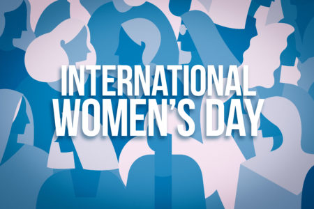 Stylized image representing women with the words "International Women's Day"
